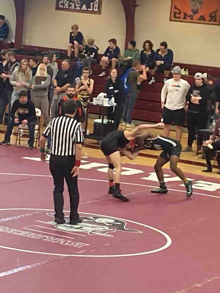 Grand Island coach teaches fundamentals of volleyball, character